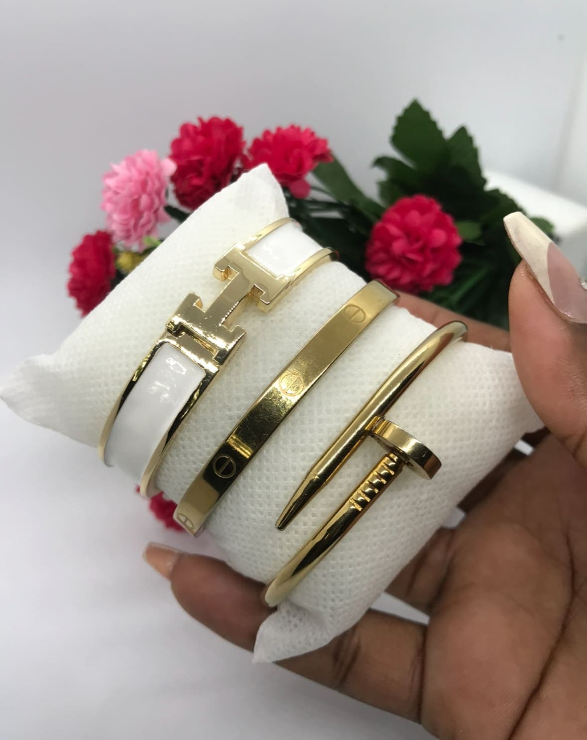 Hermes and Cartier bangle set